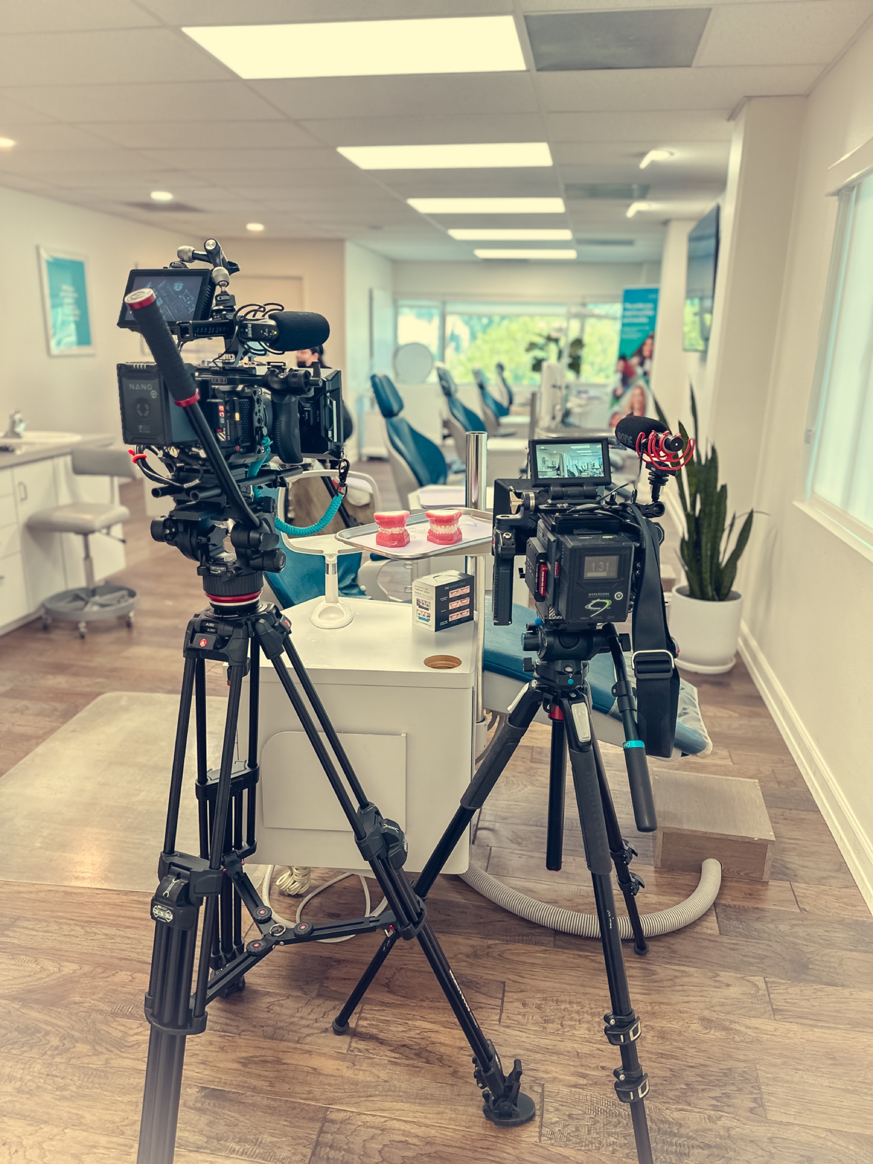 2 cinema cameras set up in an orthodontic practice on a shoot day